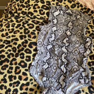 Beautiful snake skin colored soft body suit